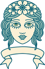 traditional tattoo with banner of female face with crown of flowers