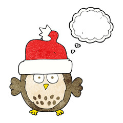 freehand drawn thought bubble textured cartoon owl wearing christmas hat