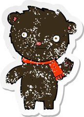 Obraz premium retro distressed sticker of a cartoon cute black bear