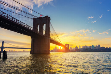 View on Brooklyn bridge and Brooklin at vibrant sunrise, New York City - 608334784
