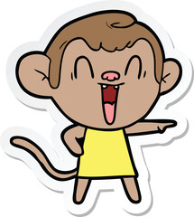 sticker of a cartoon laughing monkey