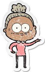 distressed sticker of a cartoon happy old woman