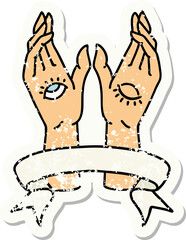 worn old sticker with banner of mystic hands