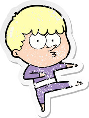 distressed sticker of a cartoon curious boy dancing