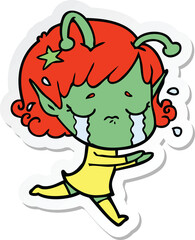 sticker of a cartoon crying alien girl