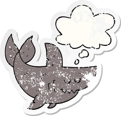 Fototapeta premium cartoon shark with thought bubble as a distressed worn sticker
