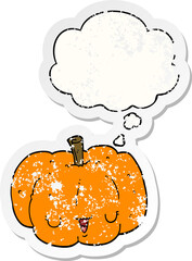 cartoon pumpkin with thought bubble as a distressed worn sticker