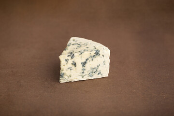 Gorgonzola cheese on top of beautiful wood