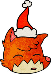 hand drawn textured cartoon of a fox face wearing santa hat