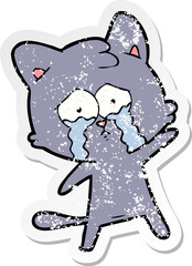 distressed sticker of a crying cartoon cat