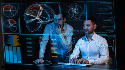 Two Caucasian bearded men are discussing medical screen of a virtual menu. Human brain research. 