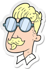 sticker of a cartoon man with mustache and spectacles