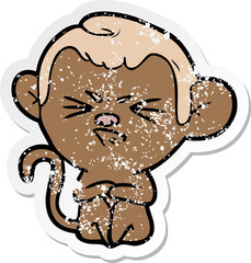 distressed sticker of a cartoon annoyed monkey