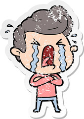 Obraz premium distressed sticker of a cartoon crying man