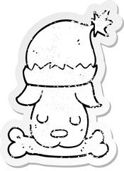 distressed sticker of a cartoon christmas dog with bone
