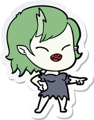 sticker of a cartoon vampire girl pointing and laughing