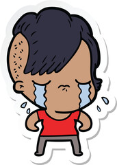 sticker of a cartoon crying girl