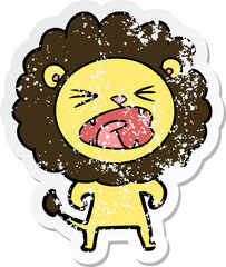 distressed sticker of a cartoon angry lion