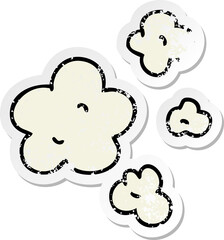 distressed sticker of a quirky hand drawn cartoon clouds
