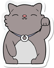 sticker of a cartoon cat waving