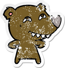 distressed sticker of a cartoon bear showing teeth