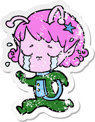 distressed sticker of a cartoon crying alien girl