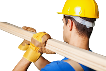 The male worker in gloves and helmet carrying wooden boards on shoulder