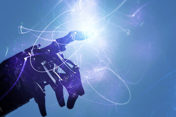 Robotic hand and light captured with long exposure. Artificial neural networks, machine learning and data mining.