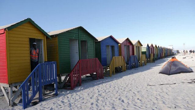 Colorful beach huts or houses at Muizenberg beach near Cape Town, South Africa. High quality 4k footage