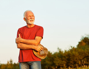 portrait senior man elderly old retirement mature gray hair farm farmer outdoor healthy active...