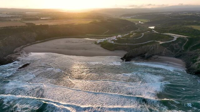 Aerial view of Praia de Odeceixe along Ribeira de Seixe river, Odeceixe, Faro, Portugal.