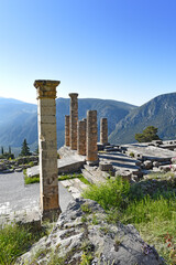 Apollo Temple in Delphi, an archaeological site in Greece, at the Mount Parnassus. Delphi is famous by the oracle at the sanctuary dedicated to Apollo