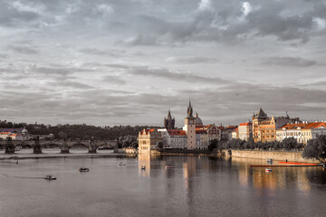 Fototapeta na wymiar Evening Prague. Vltava river and Charle's Bridge. Czech Republic