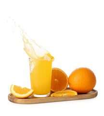 Glass of fresh orange juice with splashes on white background