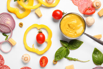 Ingredients for preparing pizza on white background