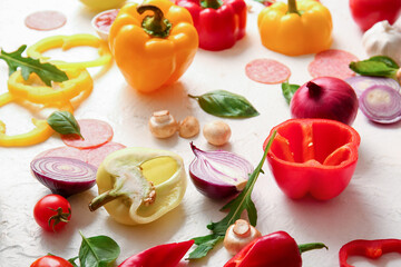 Ingredients for preparing pizza on white background