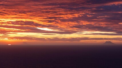 Sunset from the purple coast of Calabria, in the background the Aeolian Islands.
