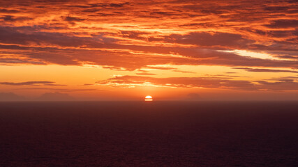 Sunset from the purple coast of Calabria, in the background the Aeolian Islands.
