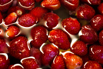 Strawberries in a white bowl.