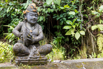 Hindu statue in the jungle of Bali Indonesia