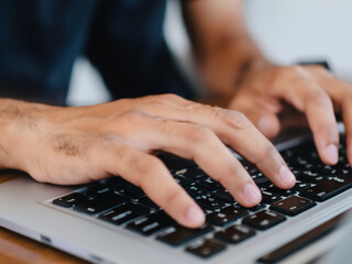Person Working, Close Up of Hands typing on a Laptop