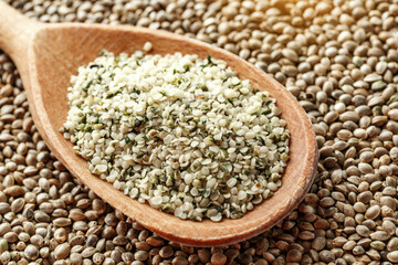 Hemp seeds.It has long been used for fibre, seeds, and oils; for example, hemp leaves have been used as vegetables and for medicinal purposes.Superfood and vegan concept.