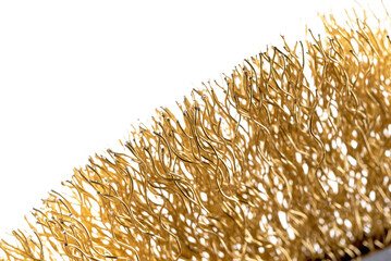 metal brush for cleaning metal with a plastic and wooden handle on a white background