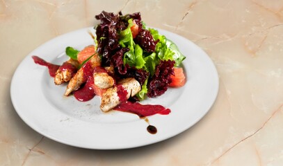 Tasty fresh meat dish with spices on the desk