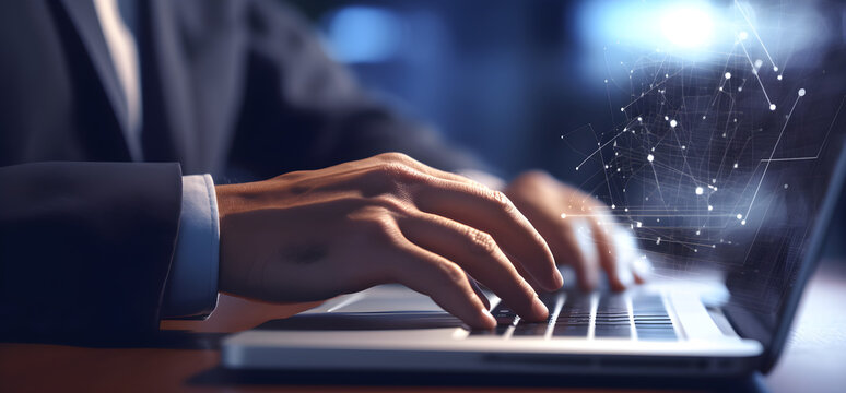 Close up of a businessman hand typing on a laptop with futuristic technology graphs projecting of the screen on a dark blue background