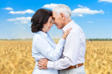 Mature old couple happy outdoors at farm