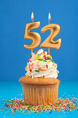 Candle number 52 - Cake birthday in blue background