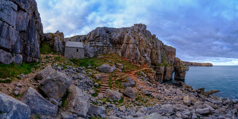 The chapel of St Govan's built into the cliffs on the Pembroke Coast
