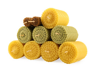 Stylish elegant beeswax candles isolated on white