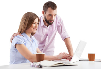 Young Happy Couple Making Online Purchase At laptop